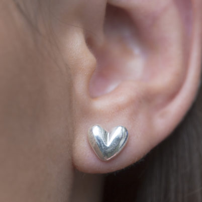 Jasmine White London Sterling silver heart shaped ear studs.